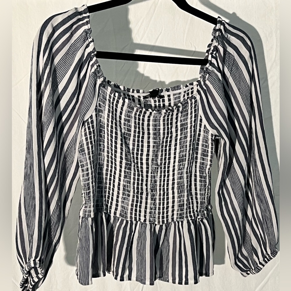 American eagle Size M smocked peplum top.  Blue and white stripe.